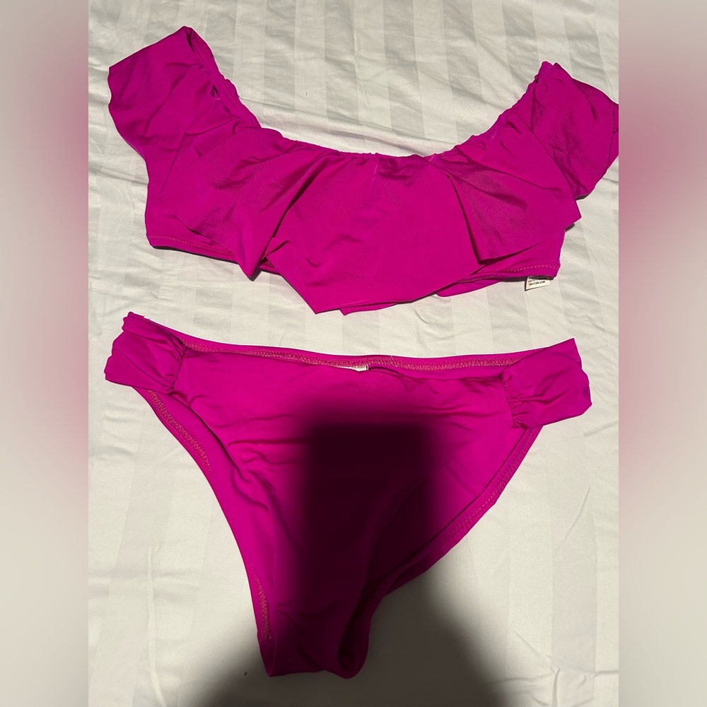 Vibrant Trina Turk bathing suit both pieces.